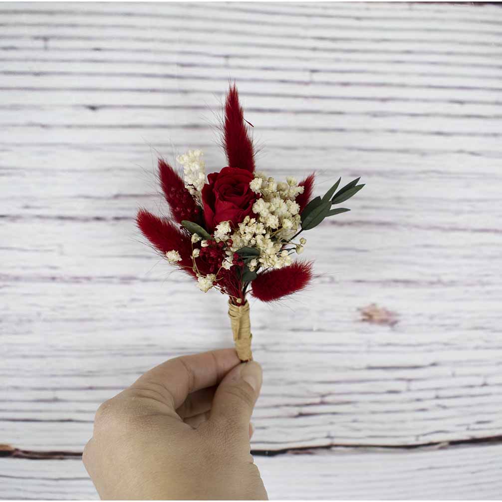 Prendido con rosita roja Lorqueño