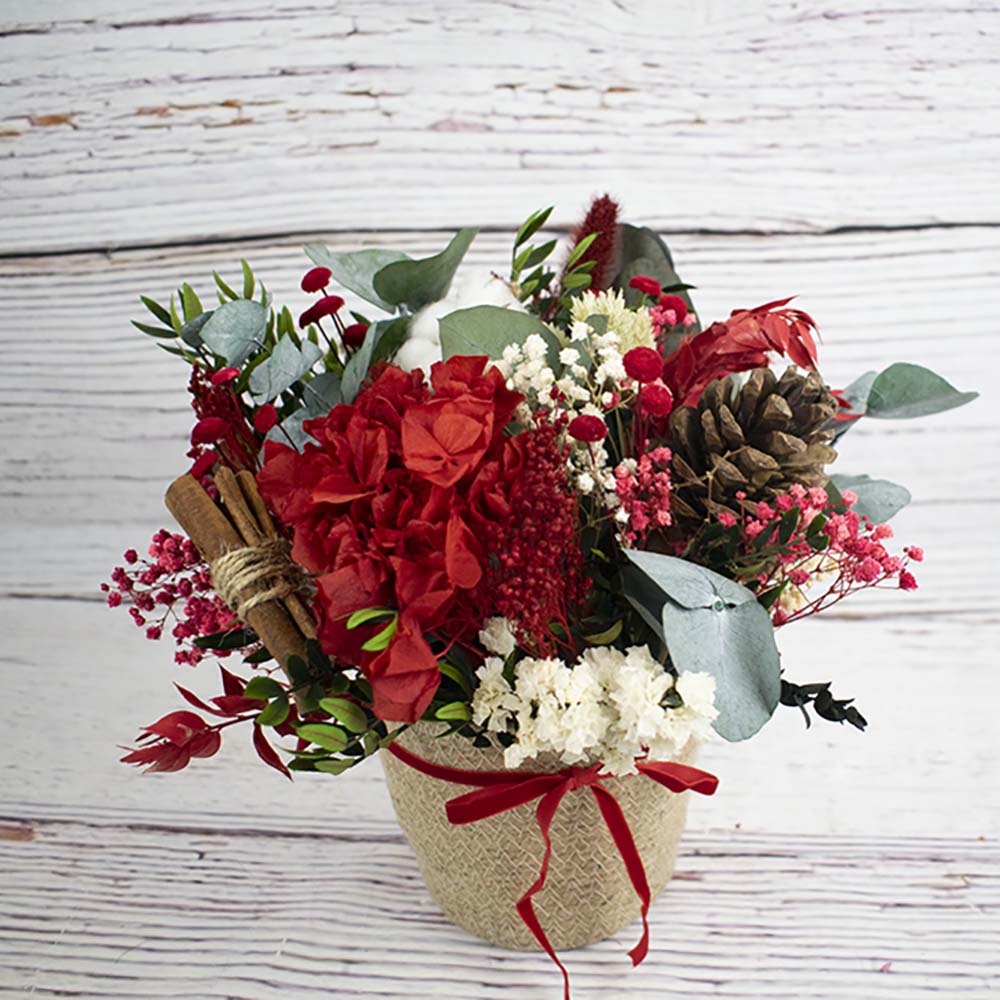 cesto rojo de flores