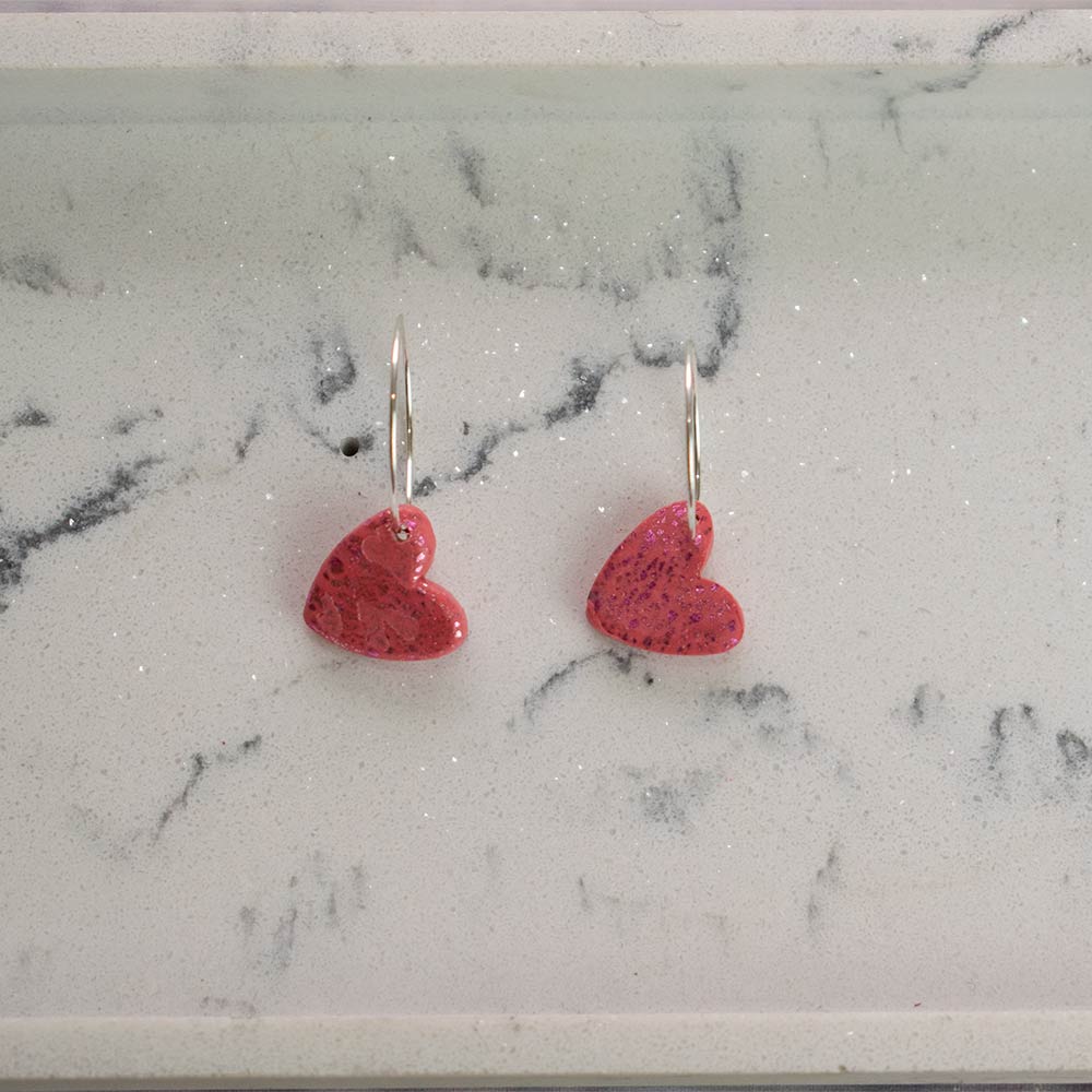 Pendiente rosado corazón