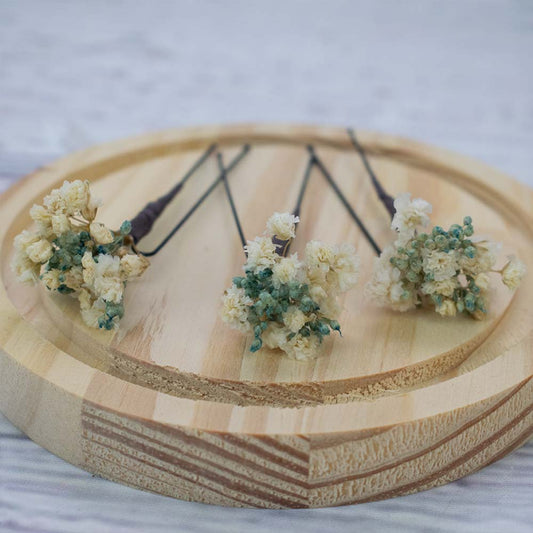 flores secas blancas y verde agua